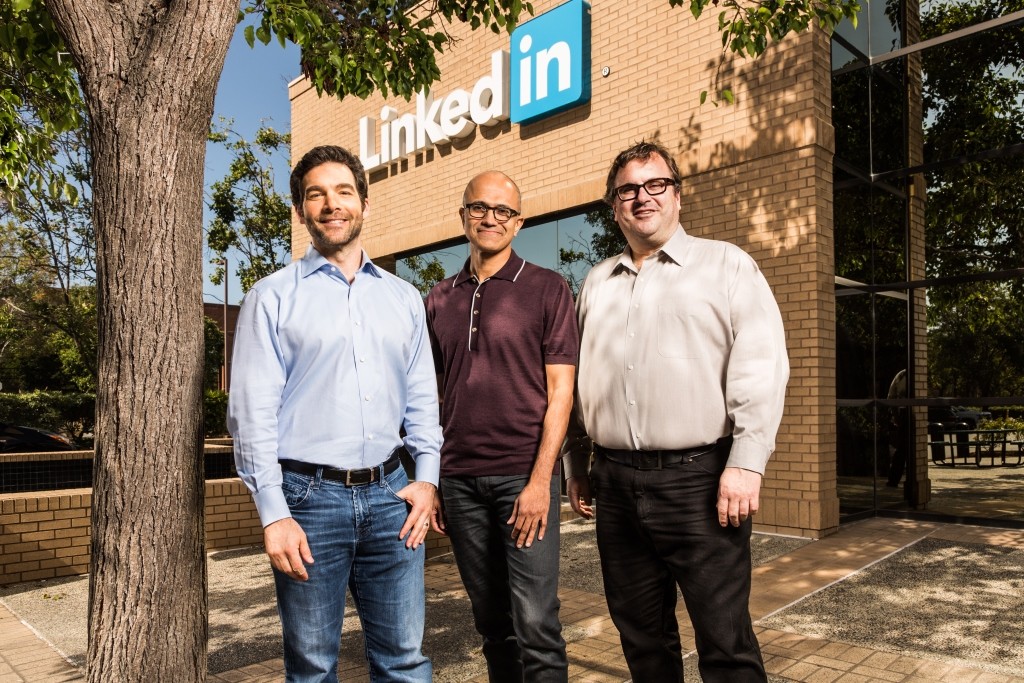 (L-R) Jeff Weiner, CEO of LinkedIn, Satya Nadella, CEO of Microsoft, and Reid Hoffman, chairman of the board at LinkedIn