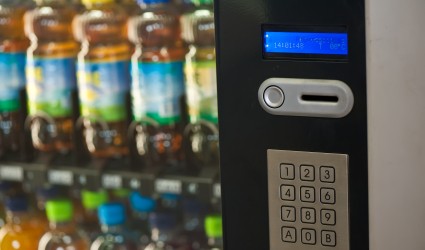 A vending machine provides various beverages