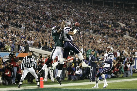 New England Patriots Rodney Harrison leaps in the air on an attempted interception during the NFL Super Bowl XXXIX football game against the Philadelphia Eagles in Jacksonville, Florida on February 6, 2005. The Patriots won 24-21.  (AP Photo/G. Newman Lowrance)
