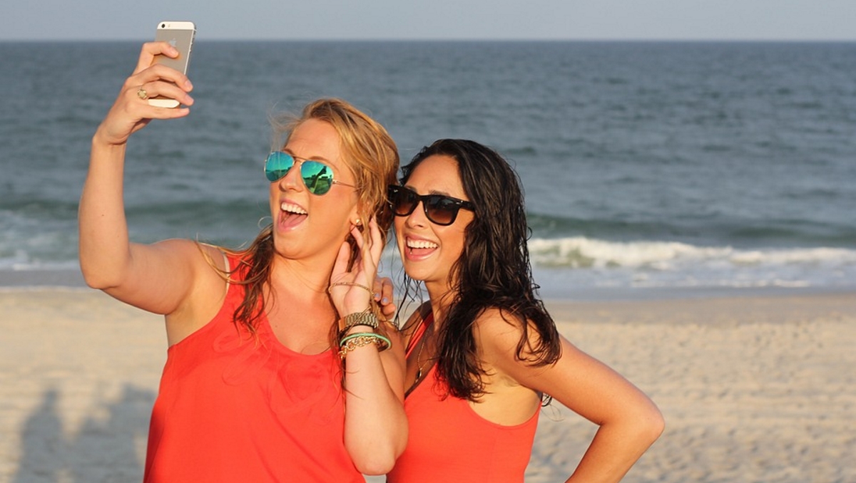 Girls selfie beach