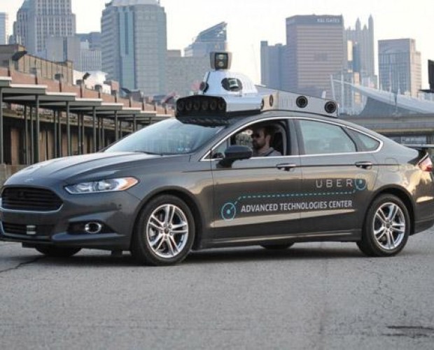 Uber suspends self-driving fleet after crash in Arizona